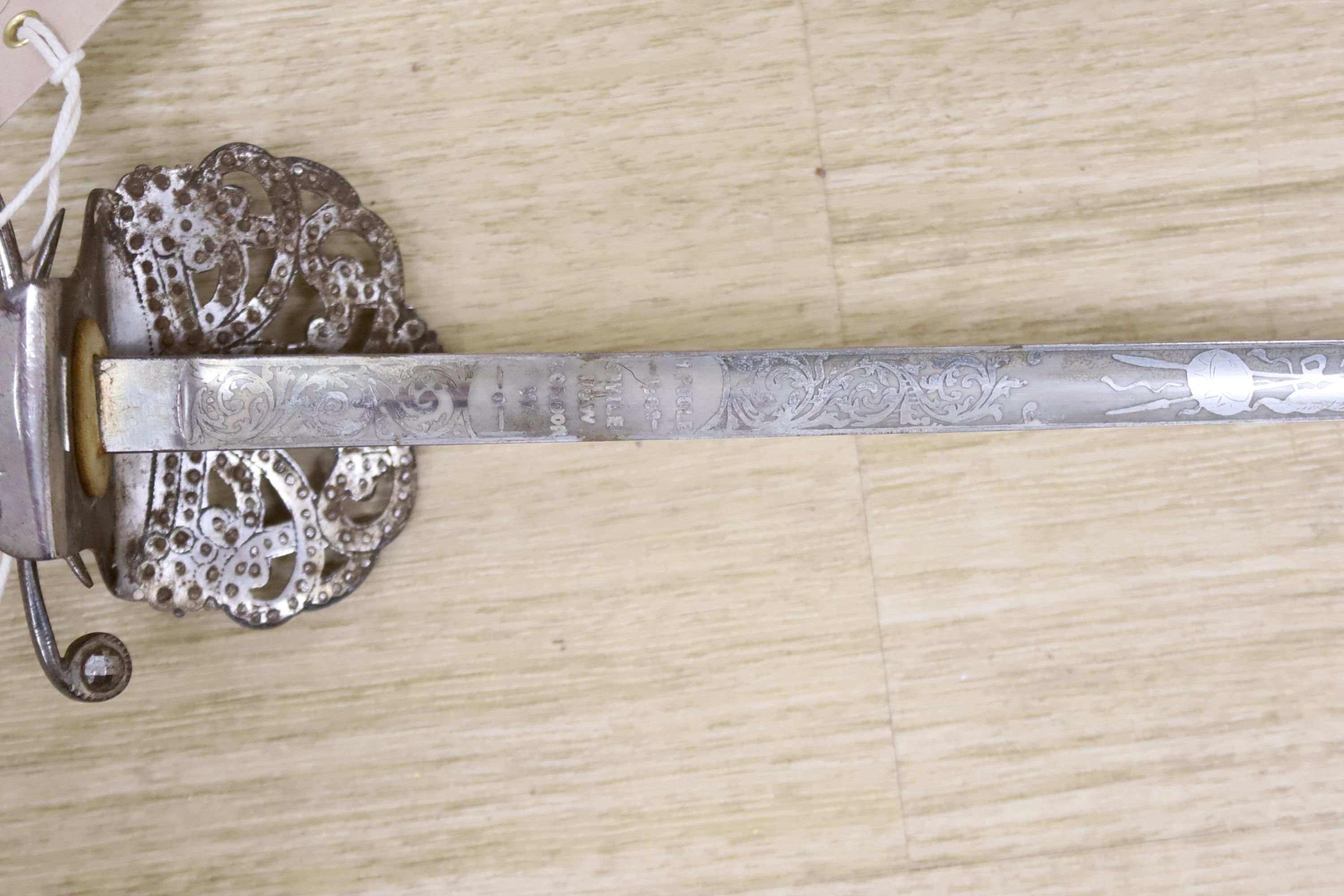 A 19th century cut steel handled dress sword, length 97cm